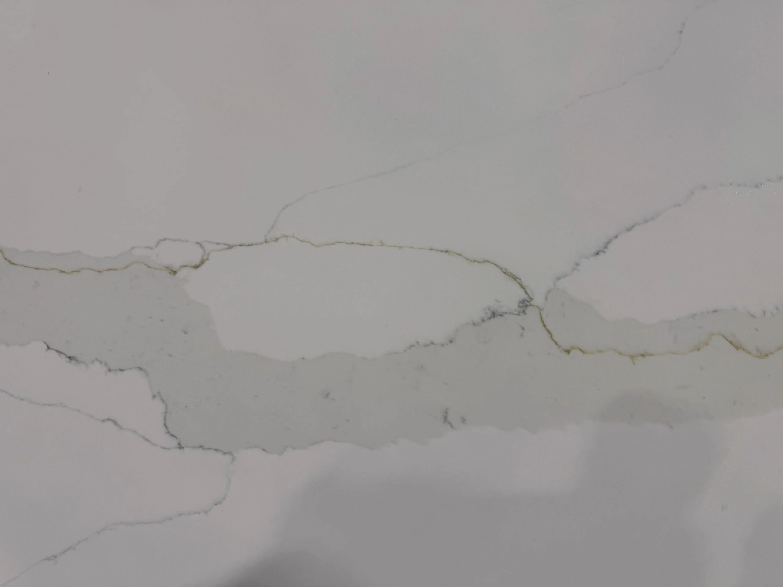 Calacatta Sierra Gold Quartz - Blue Planet